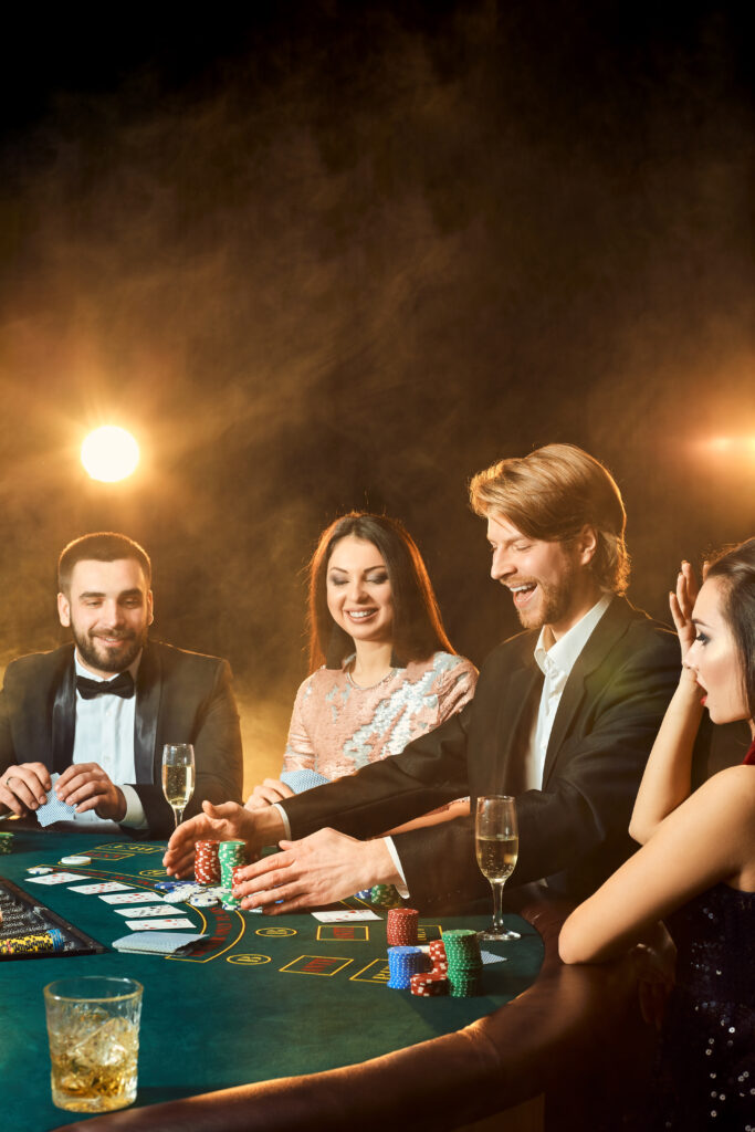 upper class friends gambling in a casino.